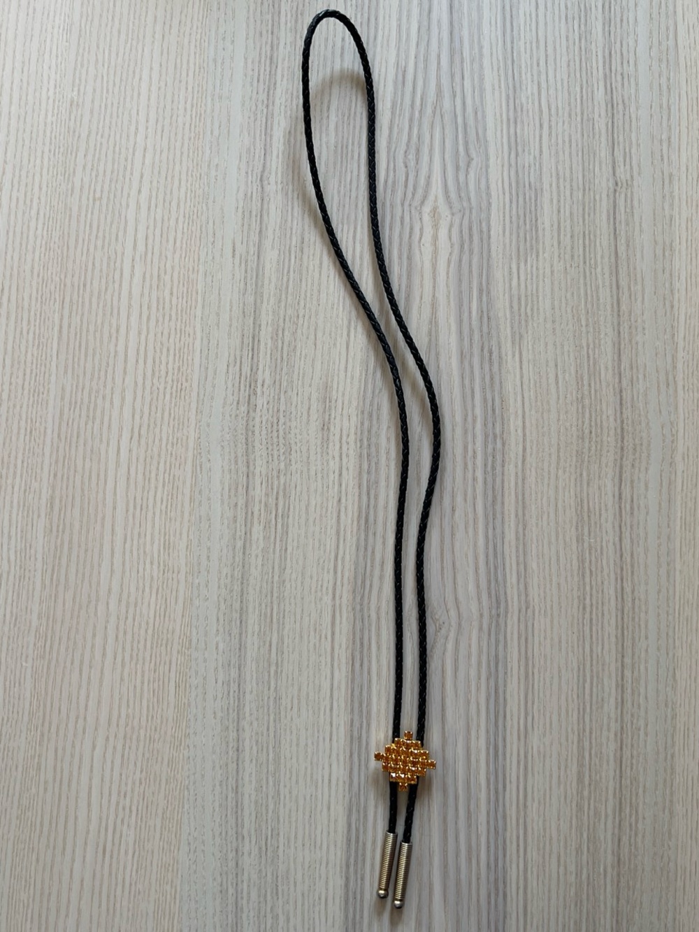 Black Woven Bolo Tie with Gold Accent